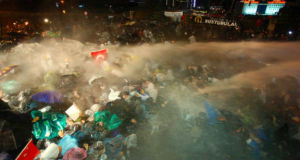 Turkish police raid Zaman HQs, fire tear gas on readers after gov’t takeover